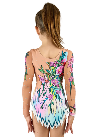 Maillot de competición con motivo de colibrí y vegetación en colores vibrantes.