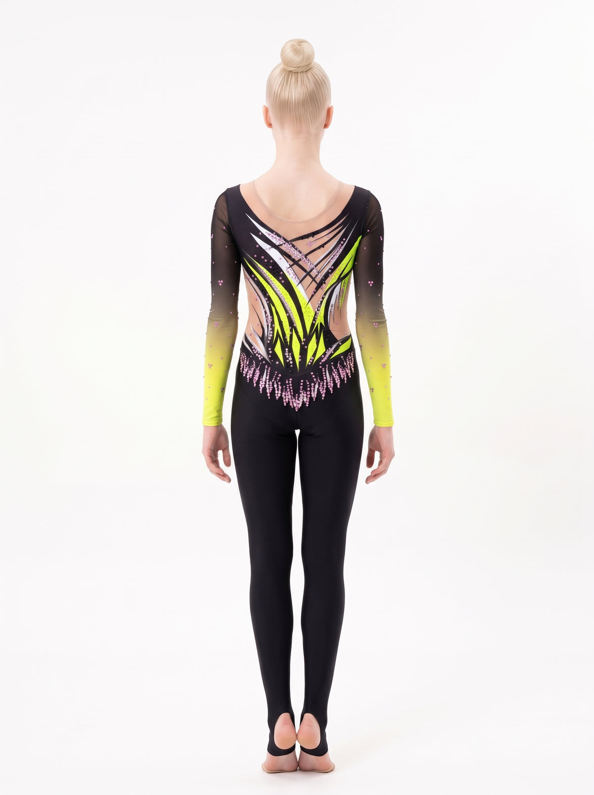 Back of the Taki rhythmic gymnastics unitard: angular yellow and black lattice, skin-tone areas and long legs with stirrups.