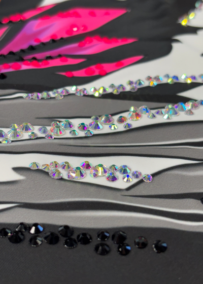 Professional sleeveless rhythmic gymnastics leotard with multicolor rhinestones.