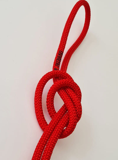 FIG approved intense red rhythmic gymnastics rope made of high resistance braided nylon.