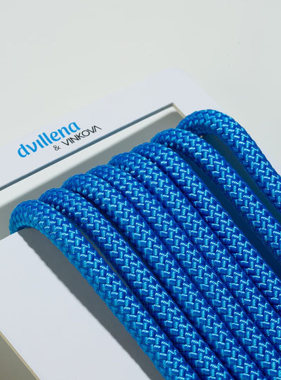 Turquoise blue Dvillena & Vinkova rhythmic gymnastics rope with compact braiding for better handling.