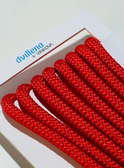 Red Dvillena & Vinkova rhythmic gymnastics rope with professional texture for secure grip.