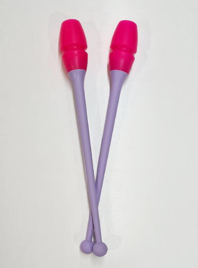 Rhythmic gymnastics connectable clubs lilac and fuchsia pink for competition.