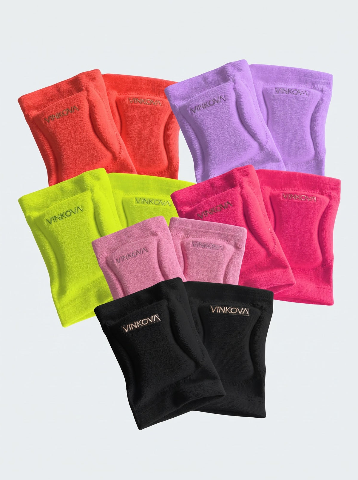 Rodilleras de gimnasia rítmica Vinkova en coral flúor, lila, amarillo flúor, rosa flúor, rosa claro y negro, vistas por pares.