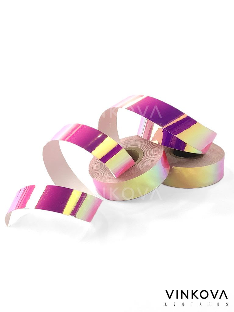 Cinta adhesiva Vinkova para aparatos de gimnasia rítmica, tornasolado, rosa y dorado, en rollos y tiras desplegadas.
