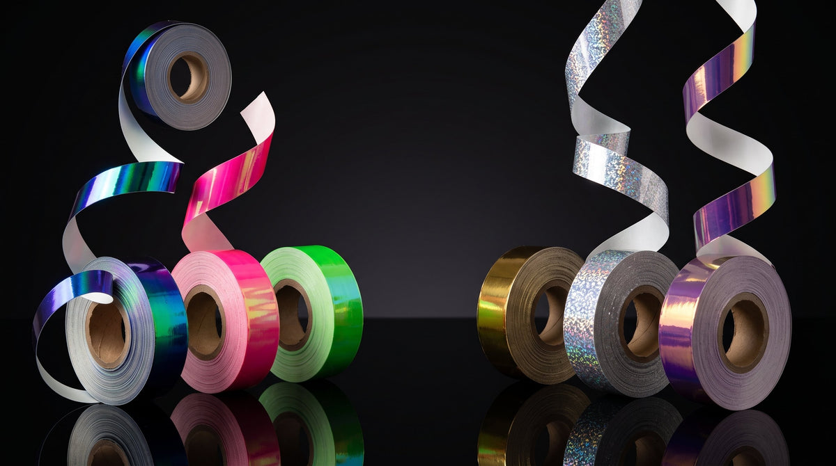 Rollos de cintas adhesivas VINKOVA de colores, tornasoladas y de espejo para decorar aros y mazas de gimnasia rítmica.